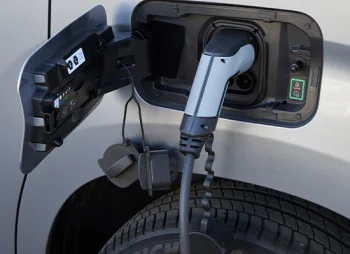 Close up of electric van charging